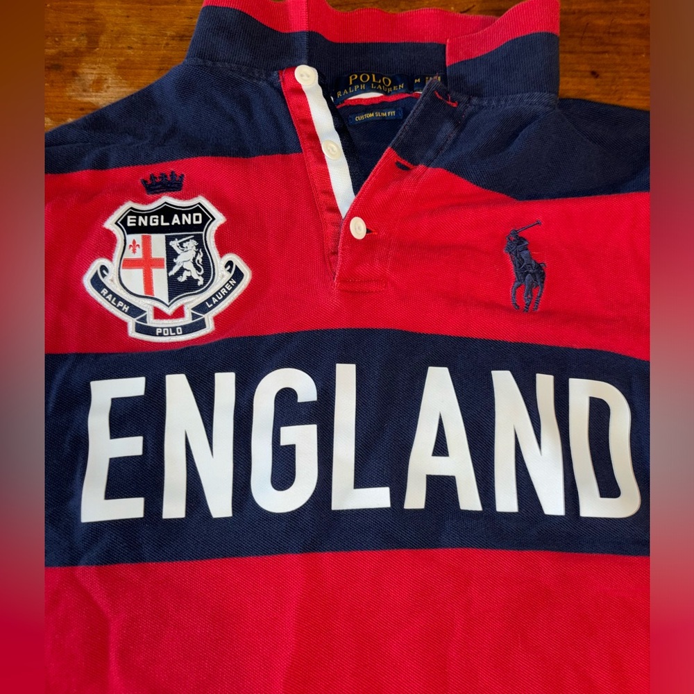 Polo Ralph Lauren. Size medium, red, Blue and and in great condition.